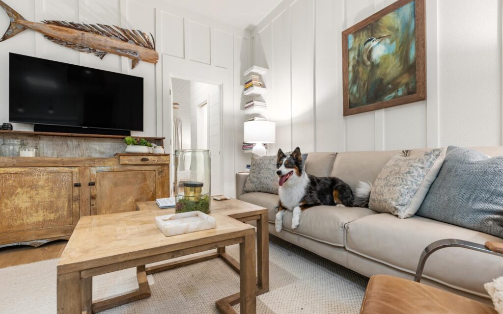 A happy dog rests in a Pet-Friendly Oversee Vacation Rental on 30A. 