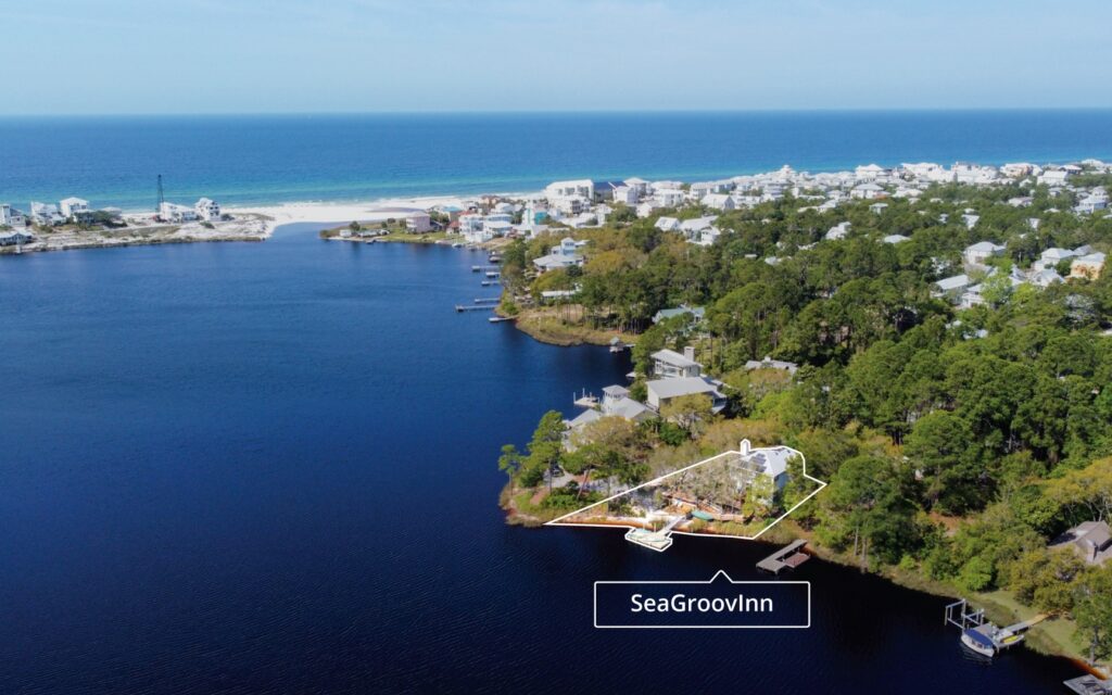 SeaGroovInn, an Oversee home, is a lakefront sanctuary, resting on the edge of a rare coastal dune lake. Embraced by the live oaks along Eastern Lake, the lush expansive property is in the shade of over 50 trees, a great place to be even during Florida's hottest months.