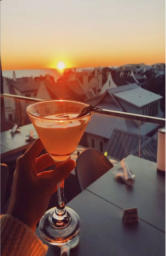 A delicious cocktail during sunset, on the rooftop bar at Pescado.