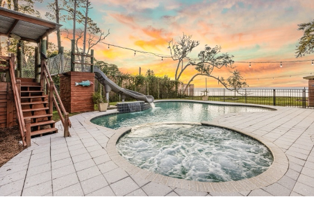 The large private pool and hot tub of Bay Place, a gorgeous Oversee Vacation Home on 30A.