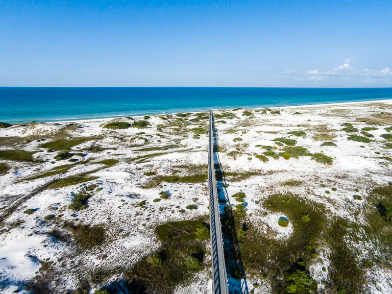 A path leads directly to a 30A beach. 