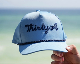 A Thirty-A script hat, featuring 3D-embroidery.