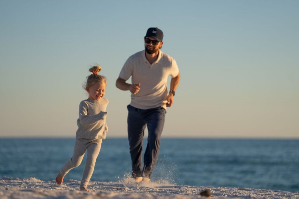 Father and daughter on the beach, 30A Florida