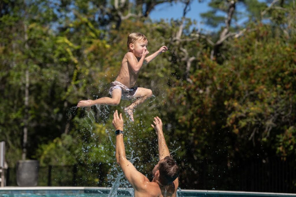 KIDS, SAND, AND POOLS.
